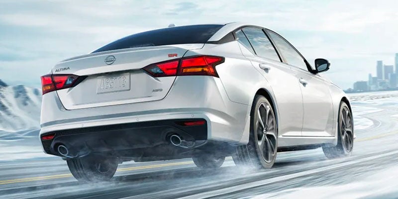 2025 Nissan Altima driving, rear view