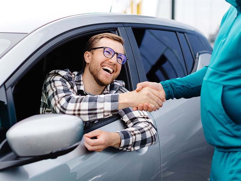 Man buying car at Nissan of Macomb in Clinton Township MI